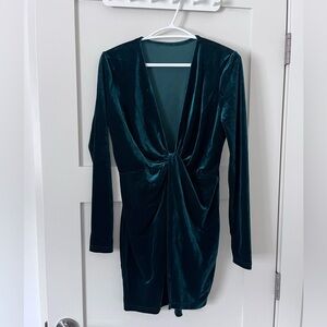 Emerald green velvet dress